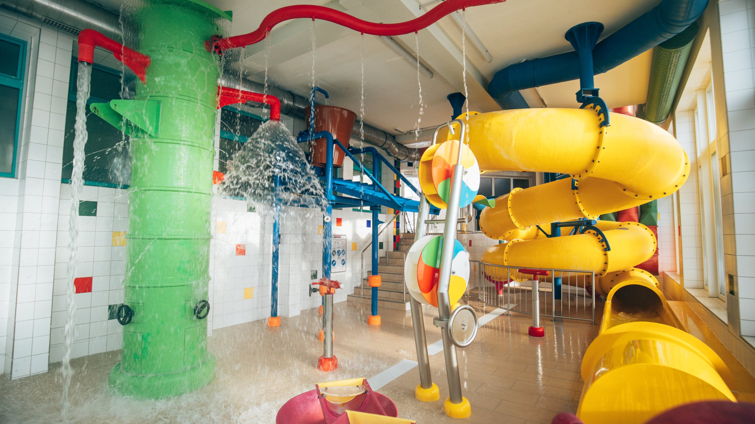 Water slide & water playground in the children's area of the thermal spa area