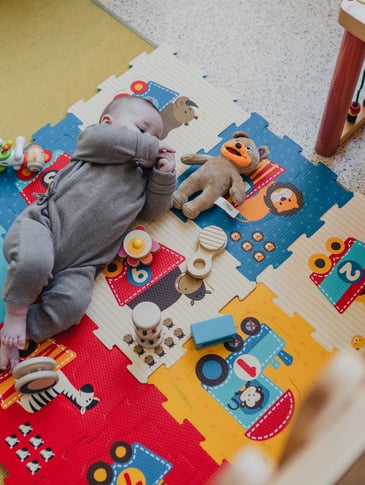 Child with Lego bricks